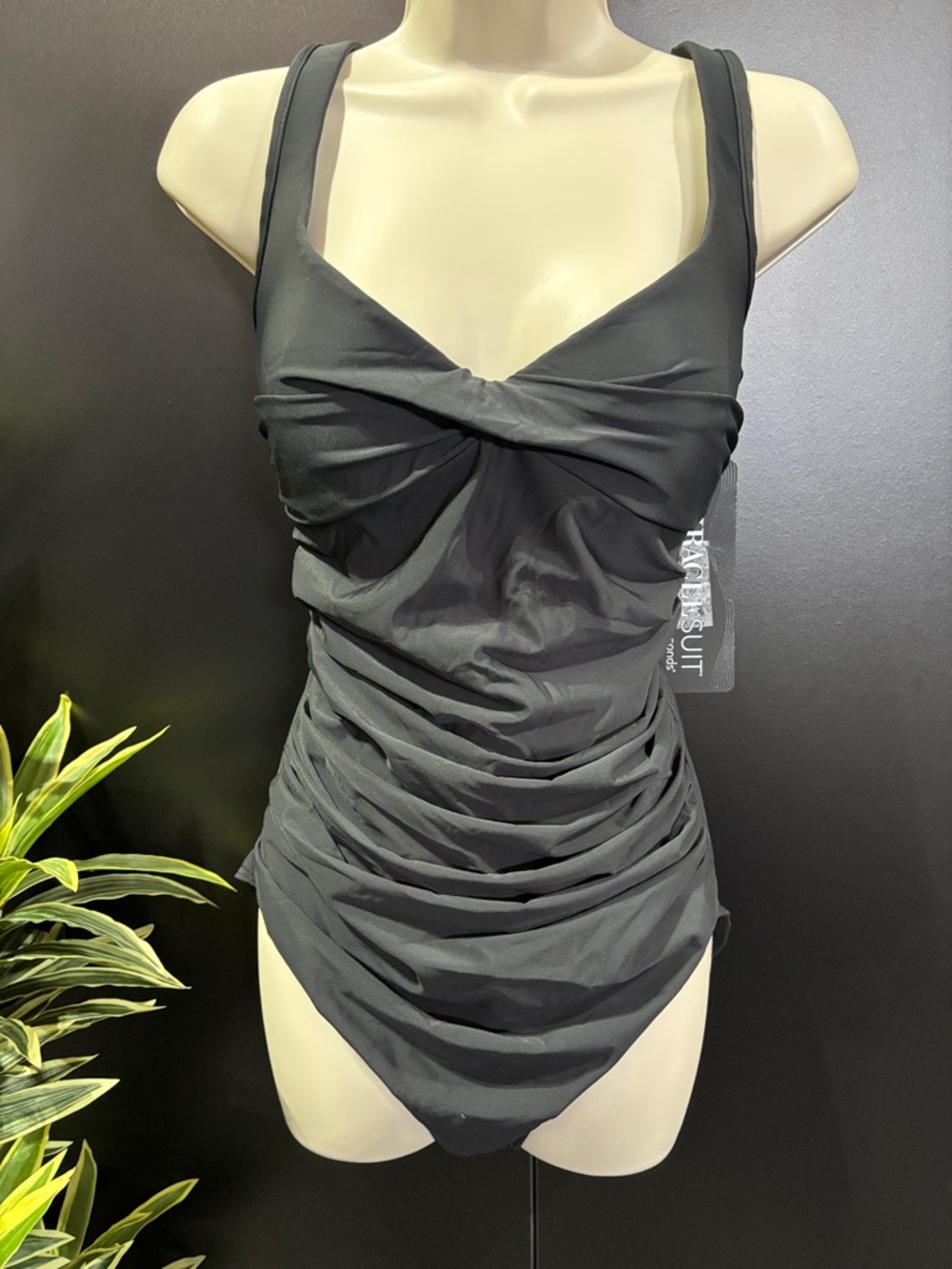 Miraclesuit V-neck,scoop back, padded underwire,ruched bodice,slimming